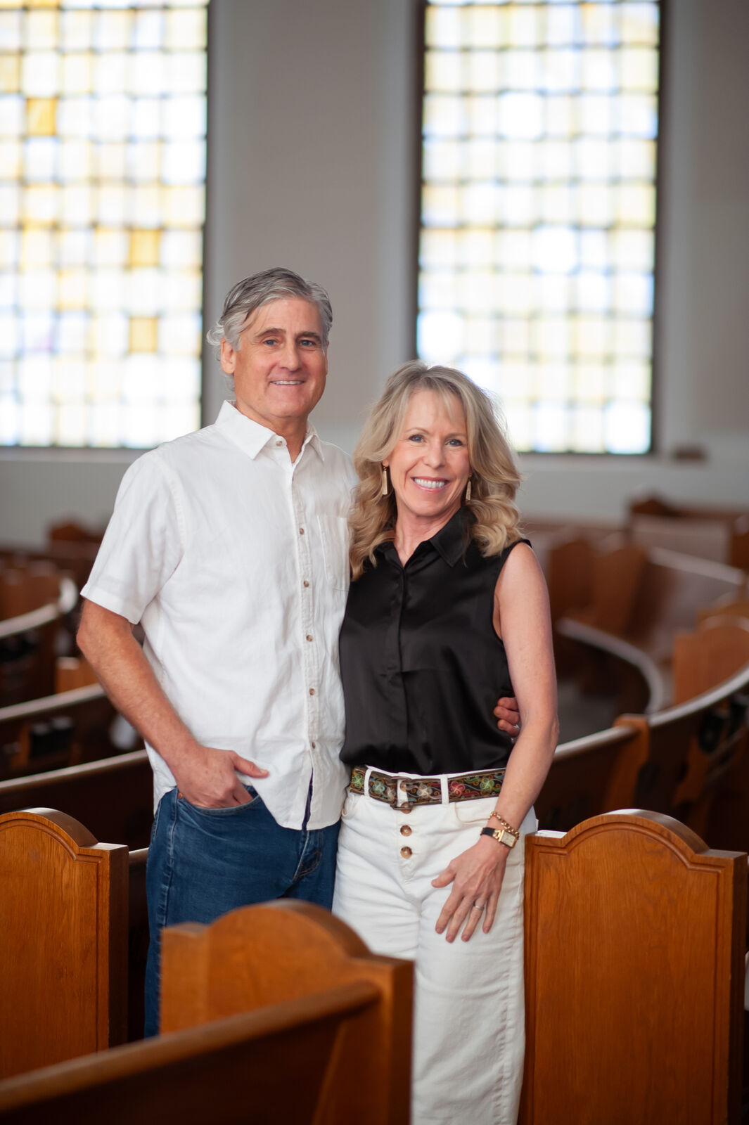 Billy and Kelly Patterson standing in a church sanctuary