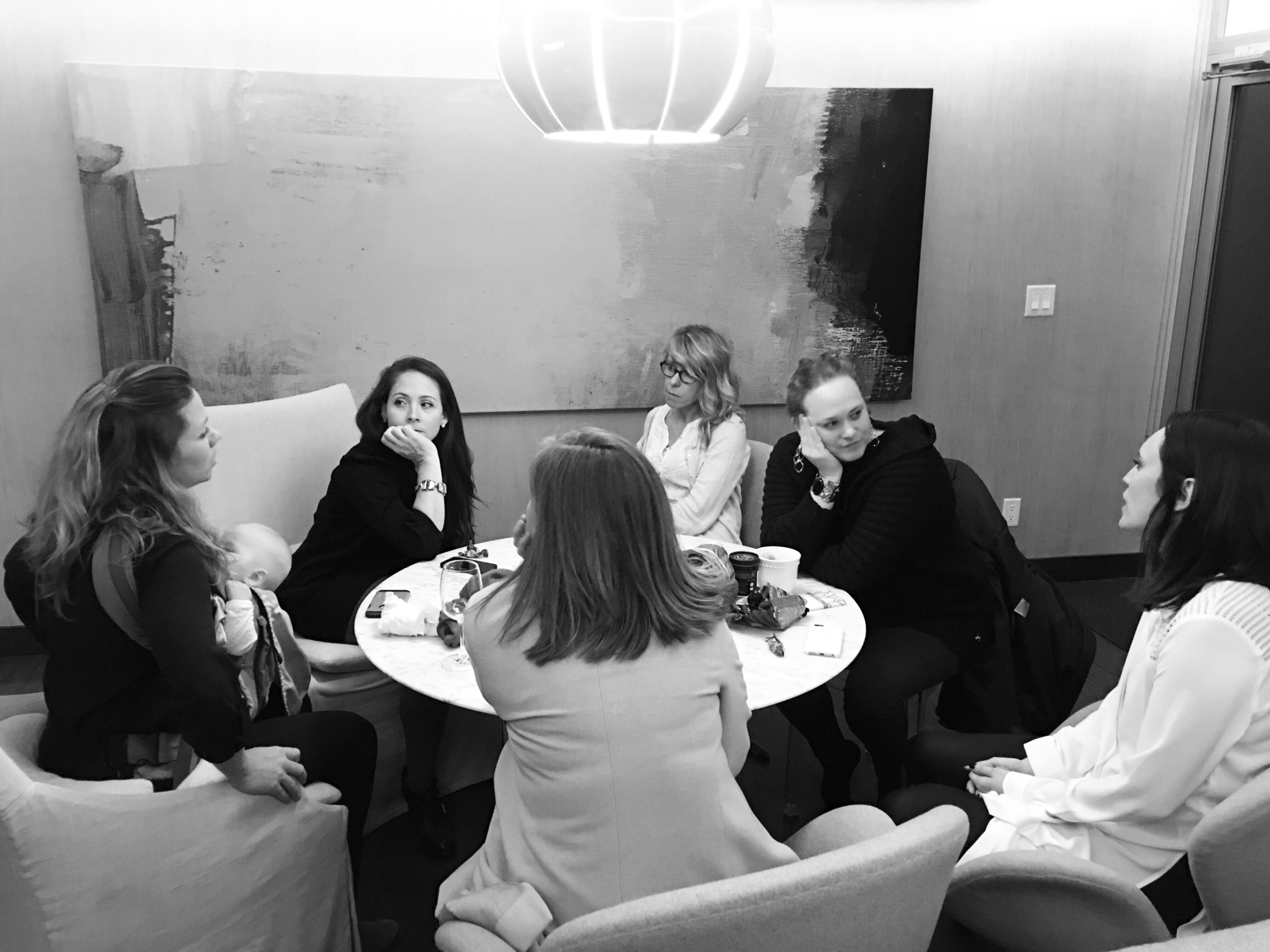 Kelly Patterson meeting with a group of women leaders